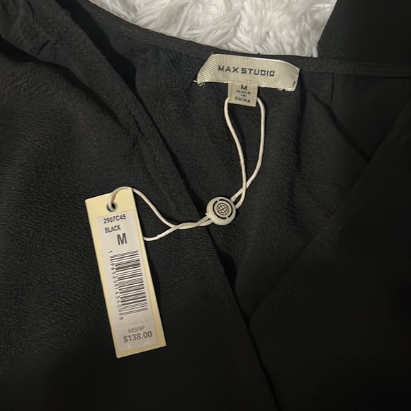 Black romper with pockets - Picture 2 of 4